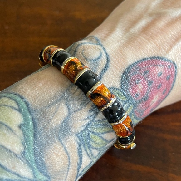 Enamelled bracelet orange black and gold done. Fits a 7.5 and smaller - Picture 5 of 6
